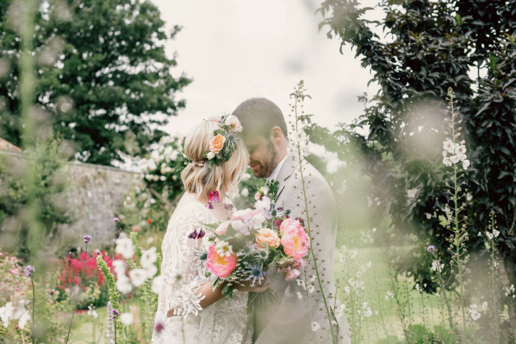 Couple Kissing in Gardens at Gileston Manor Wedding Venue